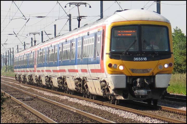First Capital Connect Class 365518 on a down train at Conington in June 2006  