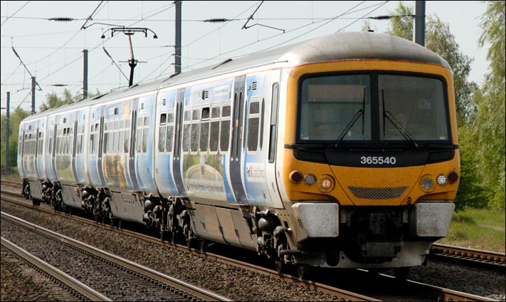 First Capital Connect 365540 at Conington on the down fast on the 29th April 2010 