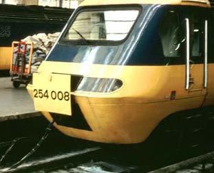 254 008 with a panel open and wires plug in between turns at Kings Cross