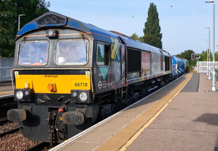 GBRf class 66718 at  March station on railhead treatment coming out from Whitemoor yard on the 21st September 2021