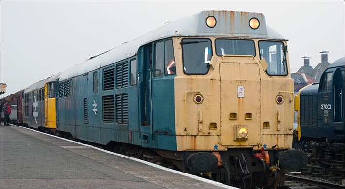 Class 31 235 and class 31 108 in  Dereham station with a train to Wymondham on Friday 4th of April 2014