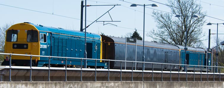 Two class 20s in BR Blue coming into the Leicester line high level platforms at Nuneaton staton 