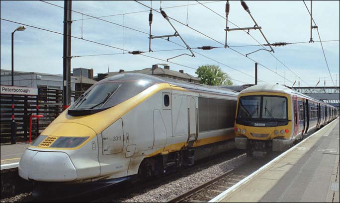 GNER 3311 is in platform two with a WAGN EMU 365519 in platform 3 