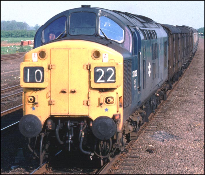 Class 37022 on a parcels train on the up slow at the site of the Walton crossing taken from the foot bridge.