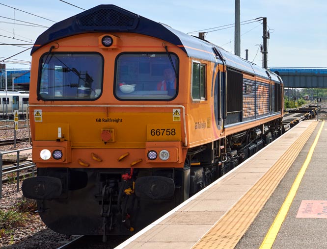 GBRf class 66758 into platform 6 at Peterborough station on the 6th of May 2022. 