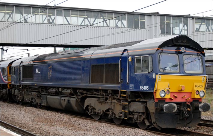 Class 66405 was at the rear of these three class 66s on the down fast at Peterborough station on 16th August 2010 66405 was at the rear of three class 66s on the down fast at Peterborough