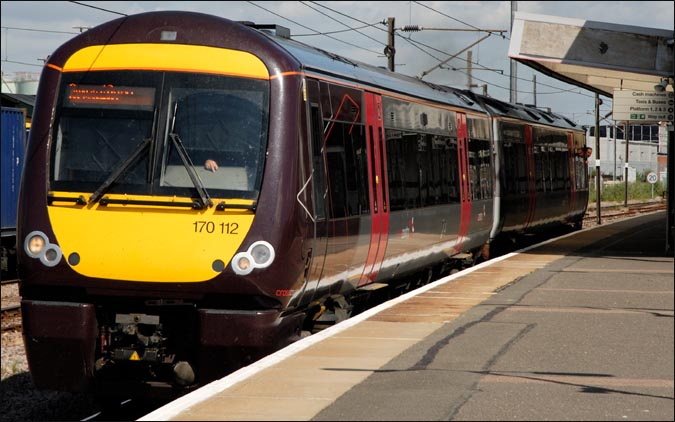Cross Country class 170 112 coming out of platform 5 at Peterborough 