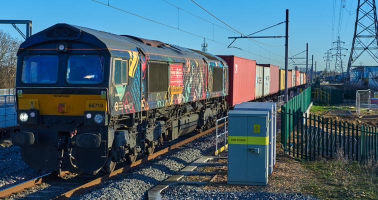 GBRf class 66718 Sir Peter Hendy CBE in London Transport Museum colours.