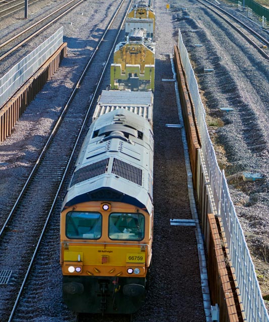 GBRf  class 66759 using the new Dive Under at Werrington on a up down train on the 17th January 2022.