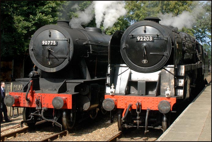 Austerity 2-10-0 90775 and  the British Railways 9F 92203 at Holt in 2007