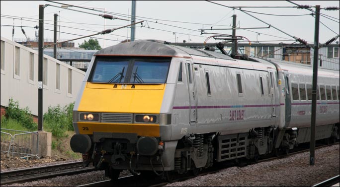 East Coast class 91129 on the down fast in Peterborough station on the 17th of June 2013 East Coast class 91129 on the down fast in Peterborough station on the 17th of June 2013