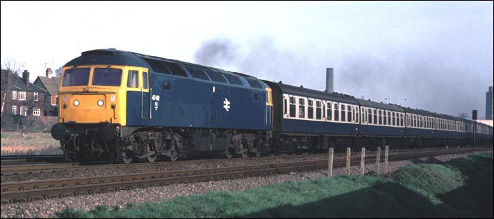 Class 47 412 on a up passenger train at Fletton .